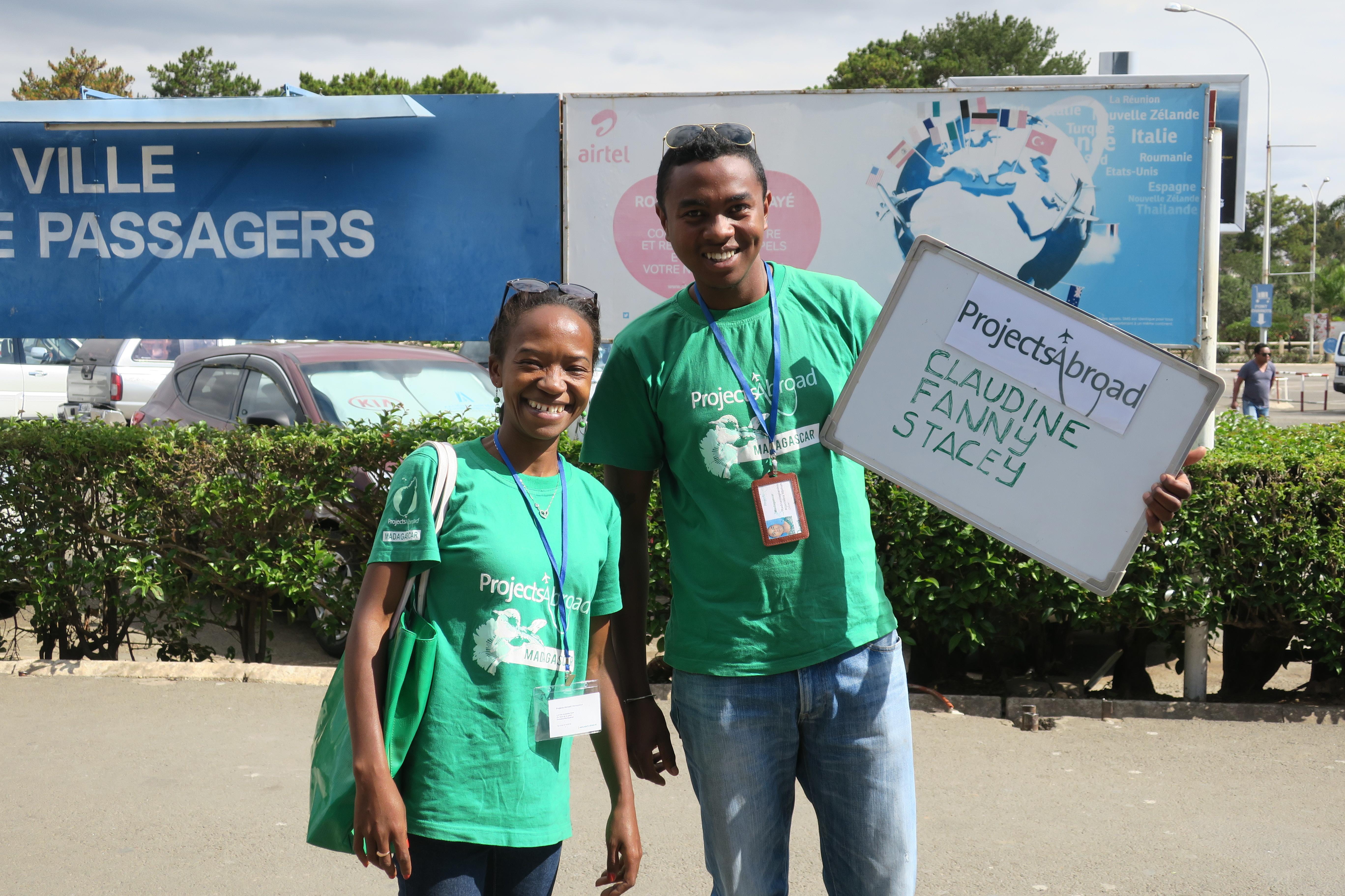 Madagascar staff wait for volunteers to land at the airport