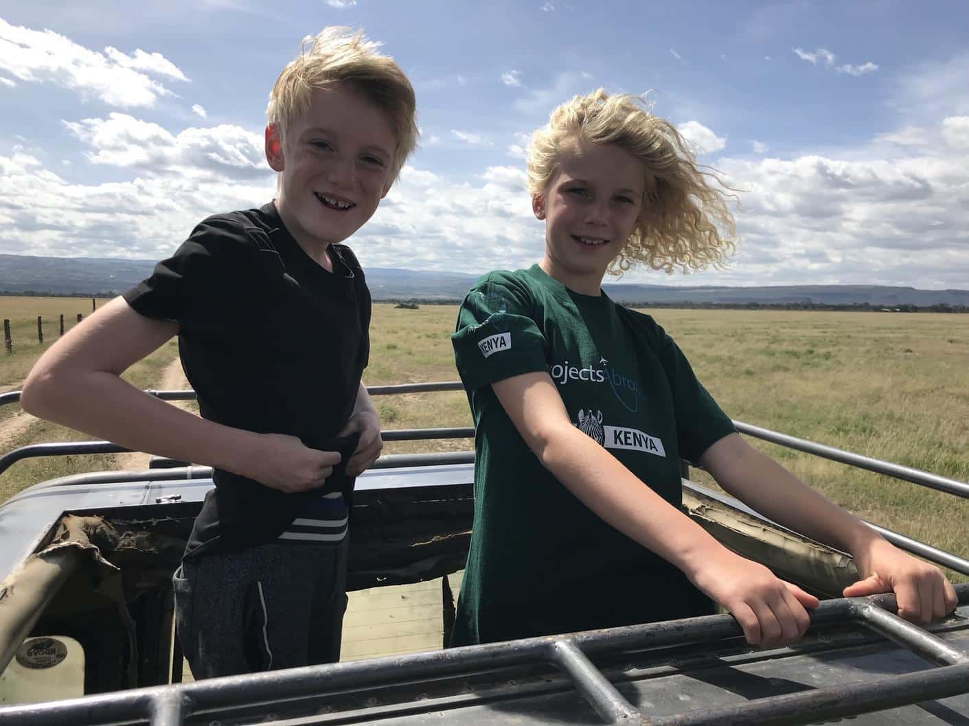 Belgian volunteers in a safari vehicle during their Conservation Project in Kenya