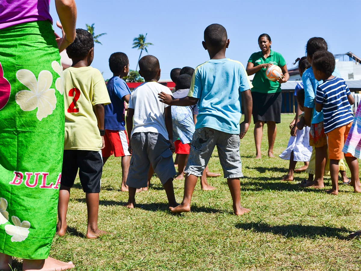 Children Playing Games Outside in Fiji
