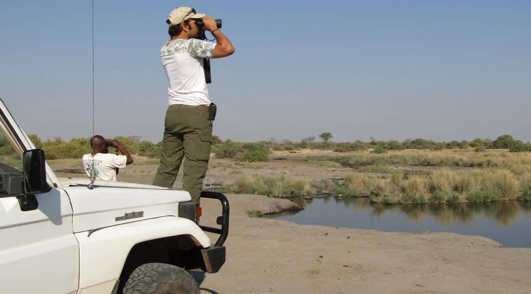 A volunteer performing a bird survey in Botswana