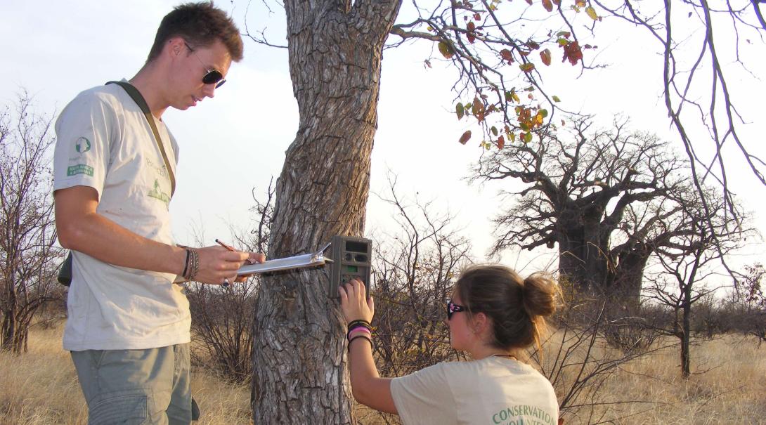 Teen volunteer monitoring a camera trap in Botswana