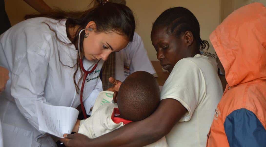 A midwifery volunteer performing health checks in Ghana