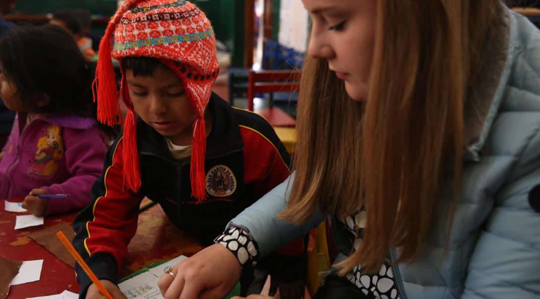 Teen helping with early childhood development in Peru
