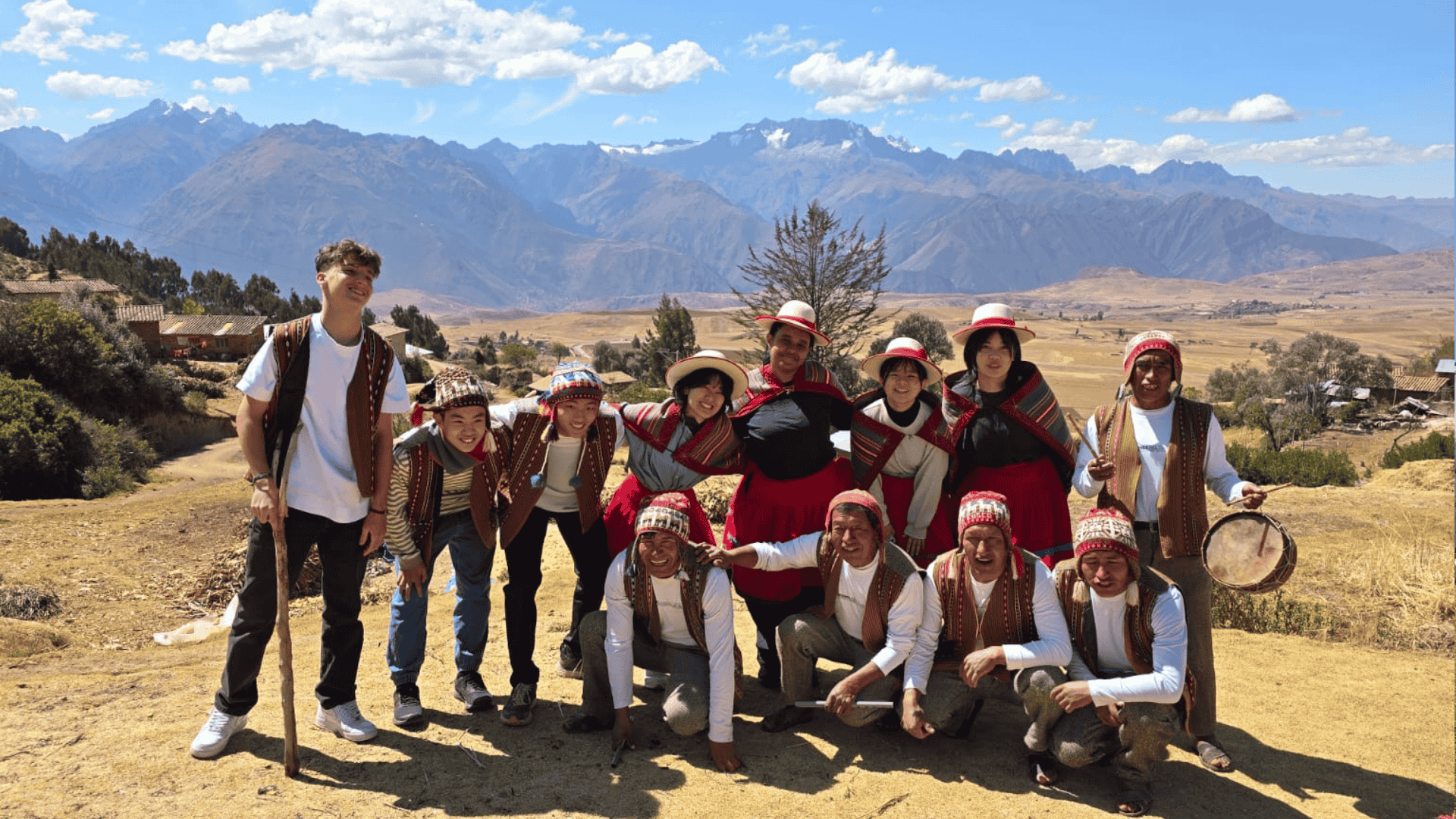 A group of Projects Abroad volunteers in traditional Peruvian clothing
