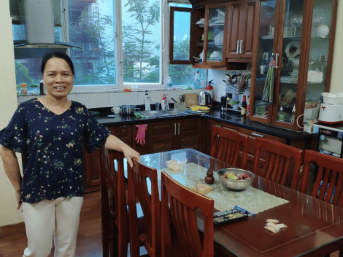 A host family mother in her kitchen