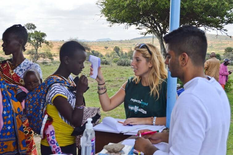 Interns completing health checkups in Kenya