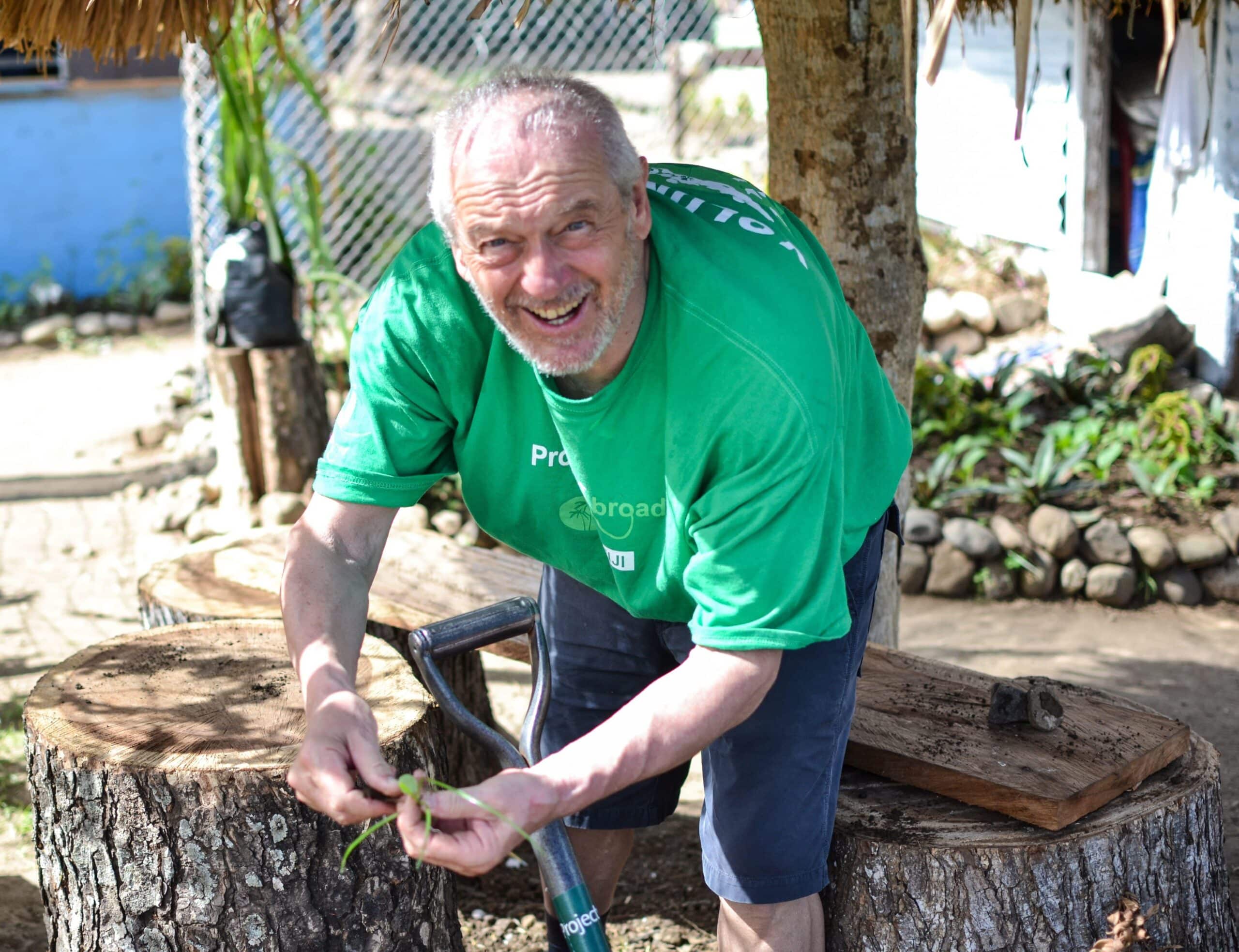 Retired volunteer helps build a vegetable garden in Fiji