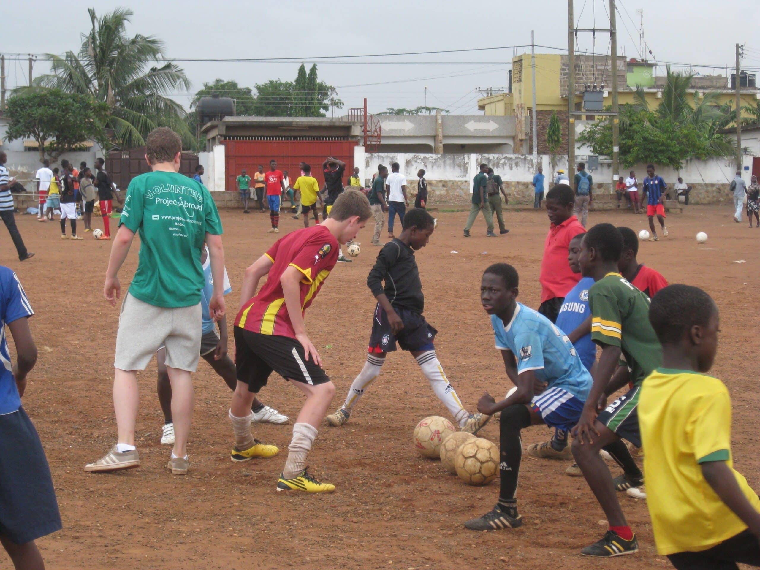 High School Football Coaching volunteers prepare a training session in Ghana with Projects Abroad.