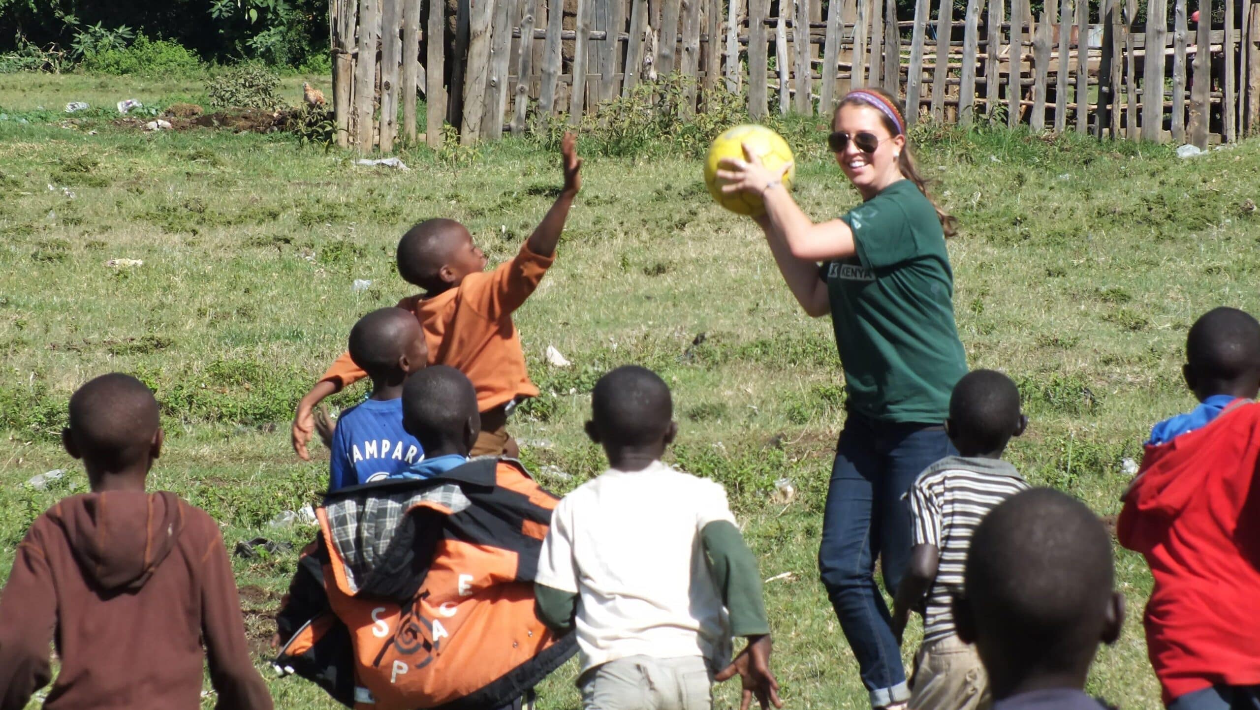 A teaching volunteers plays and practice physical activities with children in Kenya during her internship with Projects Abroad.