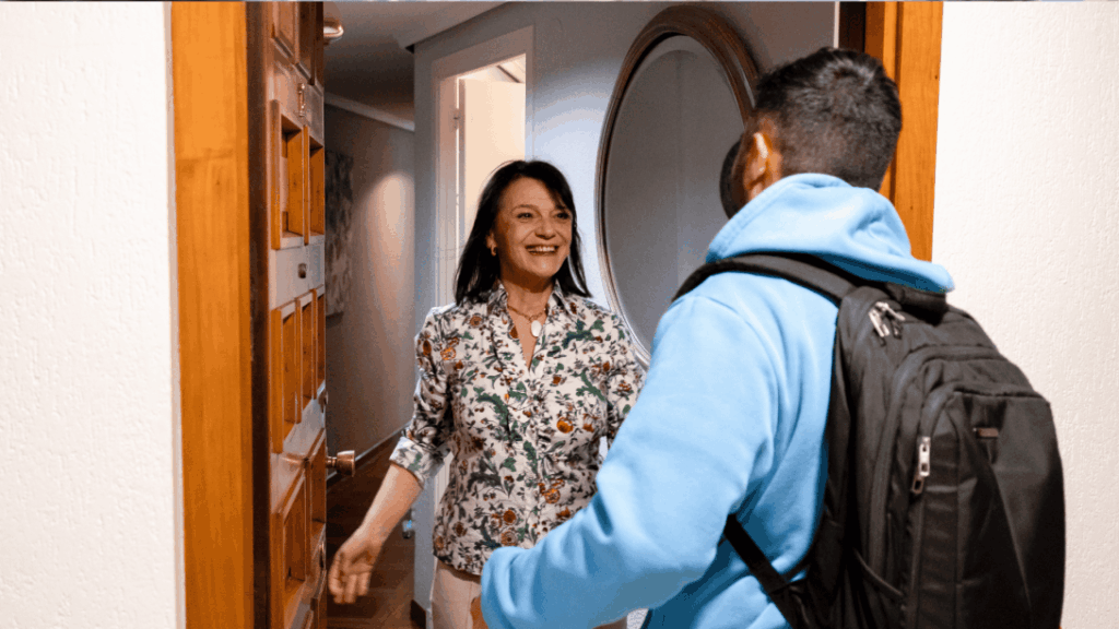 Projects Abroad volunteer receives a monk's blessing in Cambodia A host family in Valencia welcomes a new arrival