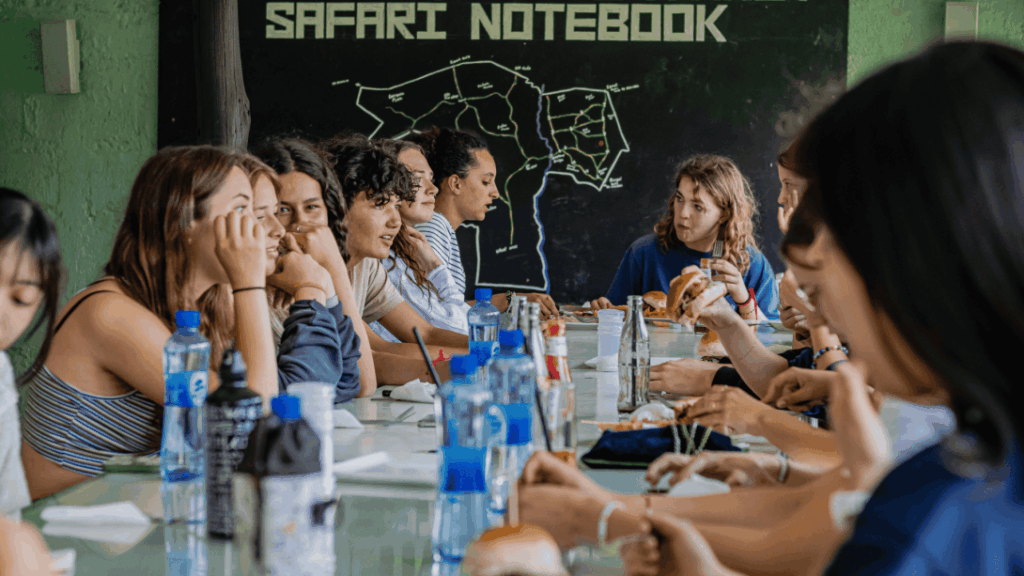 A group of Projects Abroad volunteers in traditional Peruvian clothing A group having a welcome lunch in Kenya
